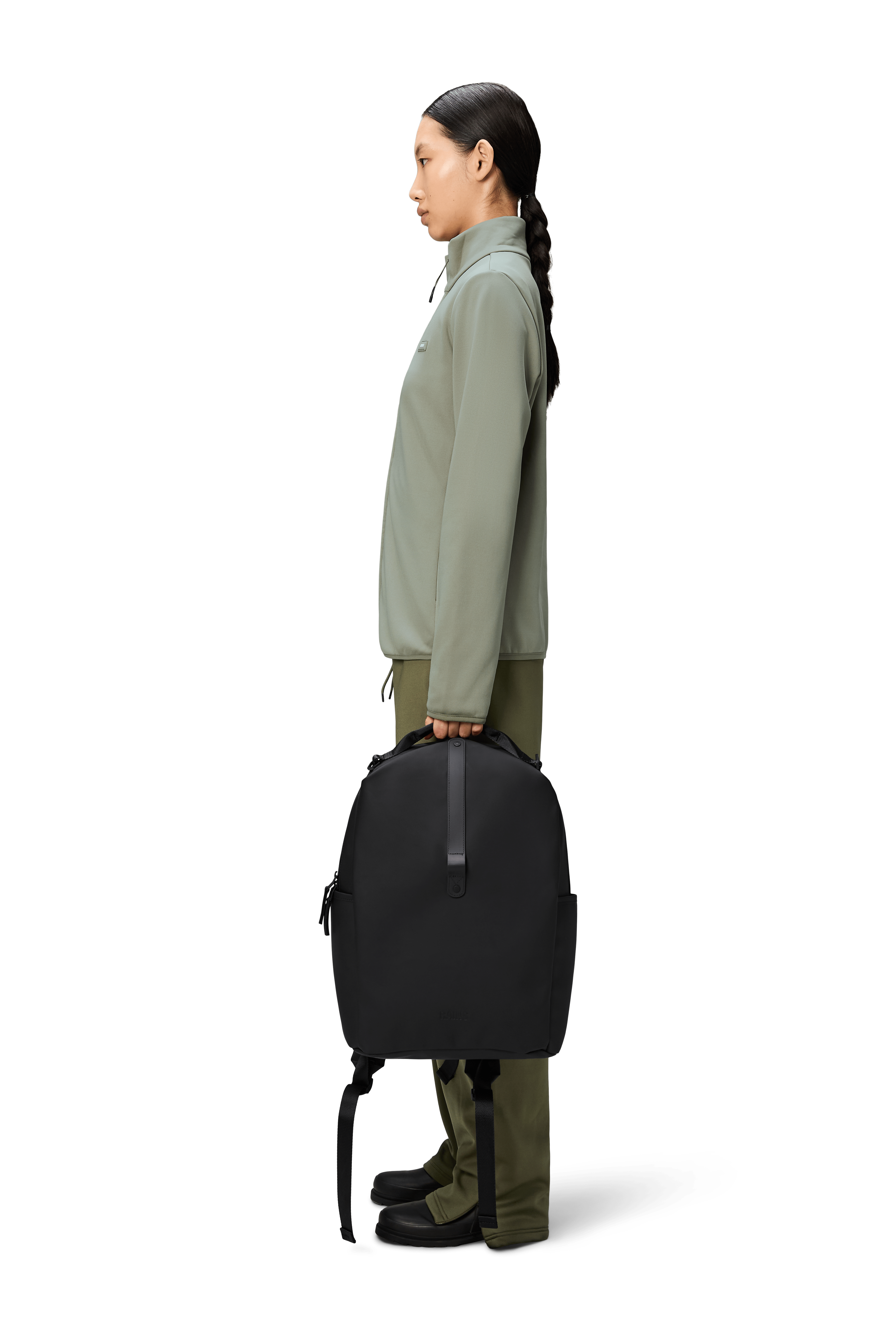 RAINS Clip Backpack side on body view