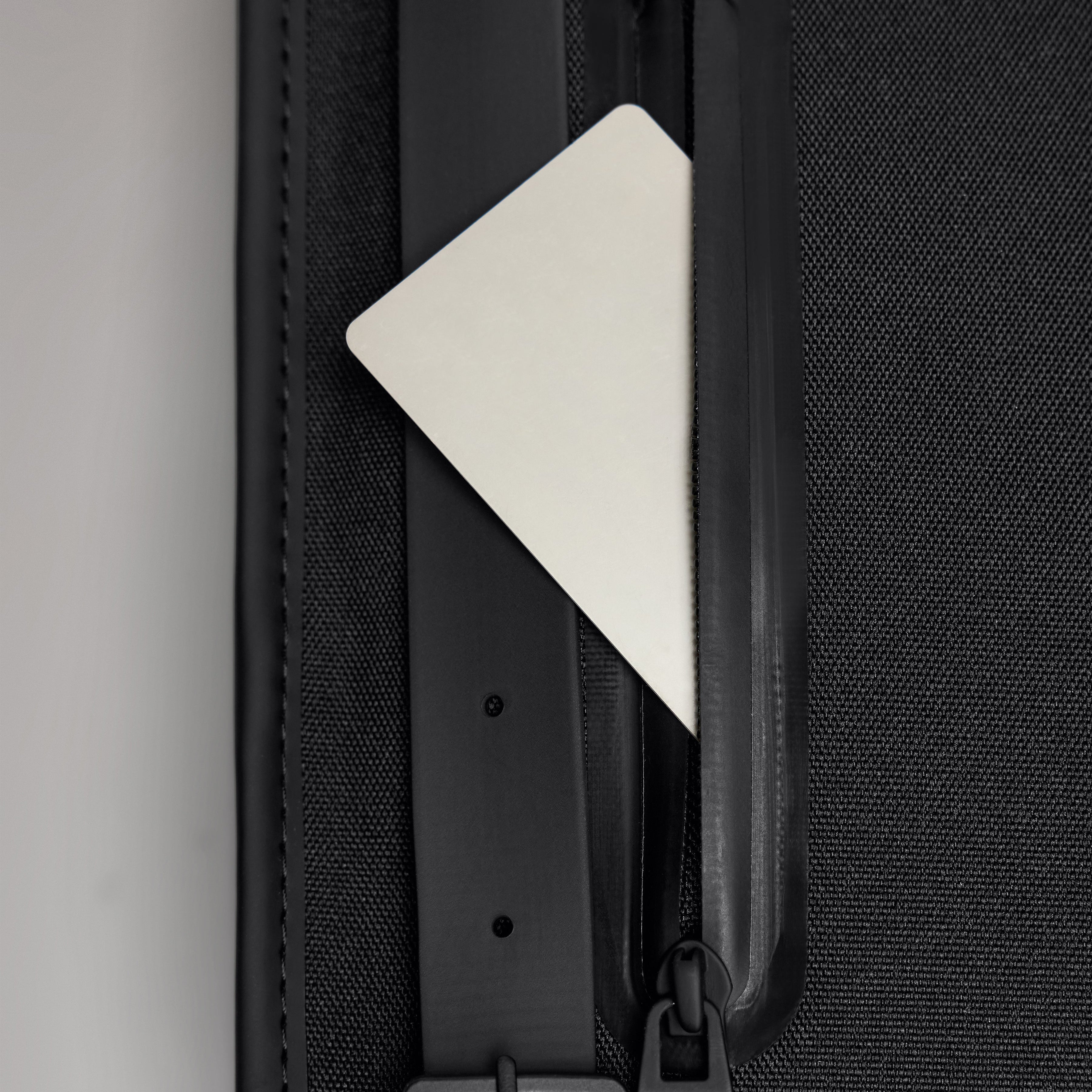 RAINS W3 Backpack Mini rear pocket detail