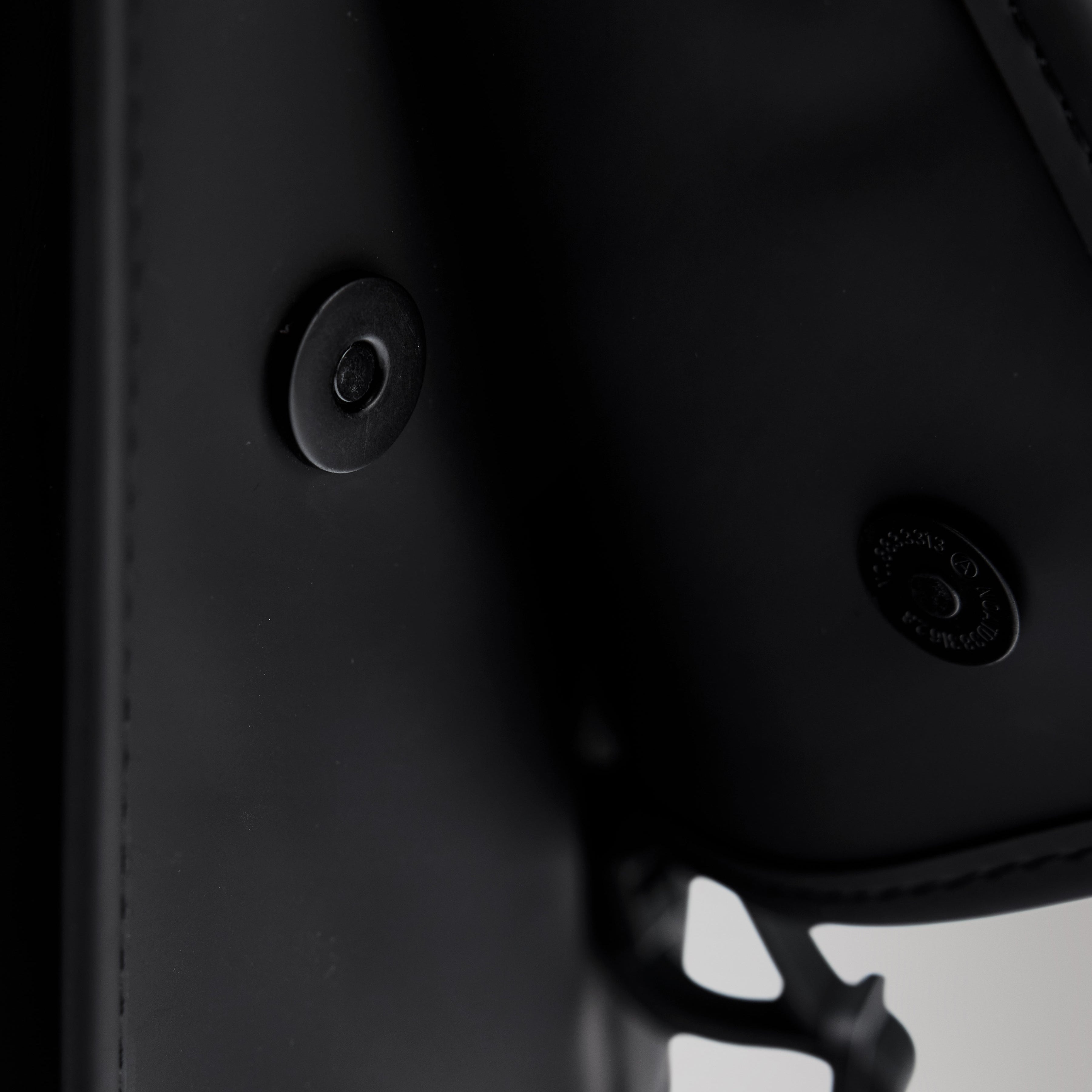 RAINS W3 Backpack Mini magnetic button detail